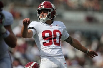 Oct 3, 2026; Starkville, Mississippi, USA; Alabama Crimson Tide kicker Lorcan Quinn (90) looks on after kicking a point after touchdown during the fourth quarter against the Mississippi State Bulldogs  at Davis Wade Stadium at Scott Field. Mandatory Credit: Petre Thomas-Imagn Images
