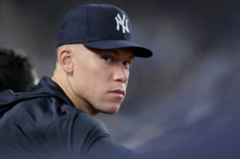 Jul 19, 2026; Bronx, New York, USA; New York Yankees injured right fielder Aaron Judge (99) watches from the dugout during the eighth inning against the Los Angeles Dodgers at Yankee Stadium. Mandatory Credit: Brad Penner-Imagn Images