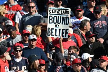 Oct 15, 2026; Cleveland, Ohio, USA;  A Cleveland Guardians fan holds up a sign during the eighth inning  against the Tampa Bay Rays in game three of the ALCS for the 2026 MLB Playoffs at Progressive Field.  Mandatory Credit: Ken Blaze-Imagn Images