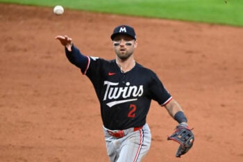 Jul 22, 2026; Cleveland, Ohio, USA; Minnesota Twins second baseman Kody Clemens (2) throws the ball to first base in the fifth inning against the Cleveland Guardians at Progressive Field. Mandatory Credit: David Richard-Imagn Images