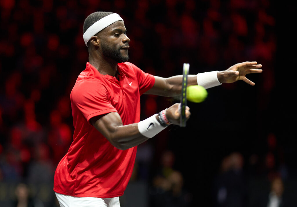 Sep 24, 2022; London, United Kingdom;Frances Tiafoe (USA) plays a shot against Novak Djokovic (SRB) in a Laver Cup singles match.  Mandatory Credit: Peter van den Berg-Imagn Images
