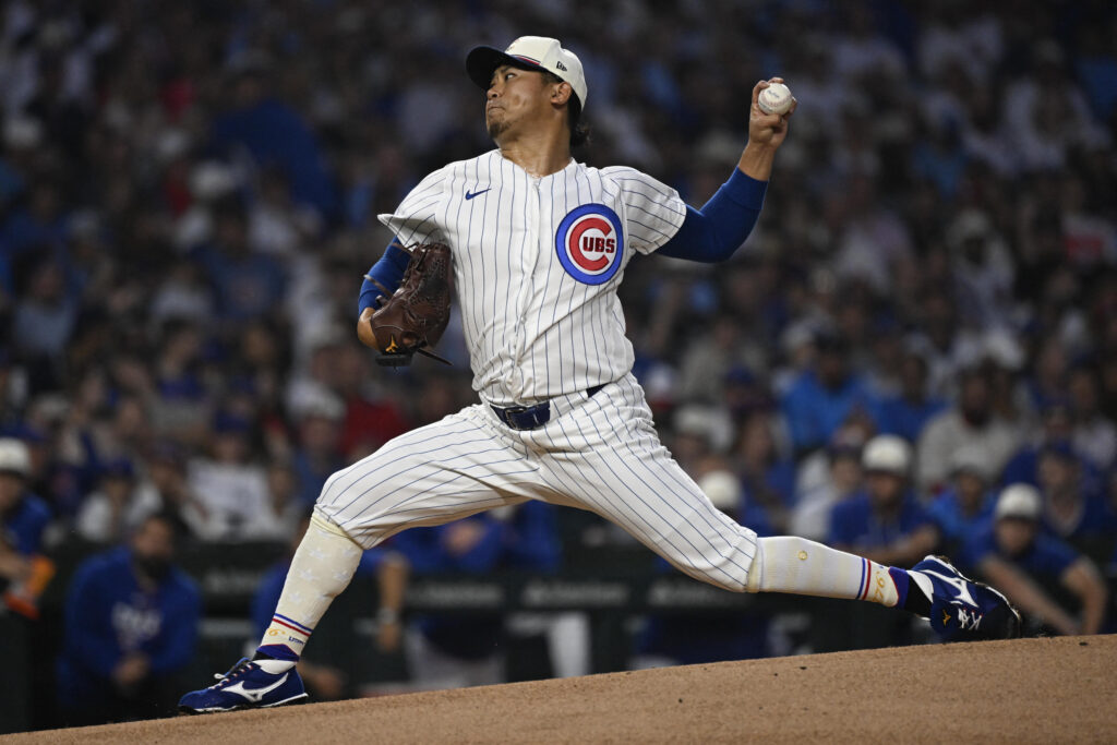 Jul 4, 2026; Chicago, Illinois, USA;  Chicago Cubs pitcher Shota Imanaga (18) delivers the ball during the first inning against the St. Louis Cardinals at Wrigley Field. Mandatory Credit: Matt Marton-Imagn Images