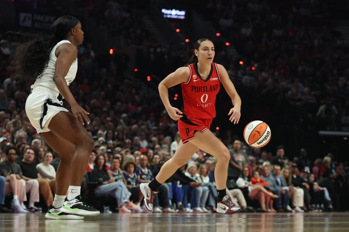 Jul 9, 2026; Portland, Oregon, USA; Portland Fire guard Carla Leite (0) controls the ball during the first half against the Las Vegas Aces at Moda Center. Mandatory Credit: Soobum Im-Imagn Images