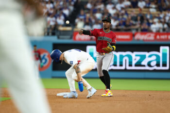 Jul 2, 2026; Los Angeles, California, USA;  Los Angeles Dodgers center fielder Andy Pages (44) tagged out by Arizona Diamondbacks right fielder Corbin Carroll (7) at second base at Dodger Stadium. Mandatory Credit: William Navarro-Imagn Images
