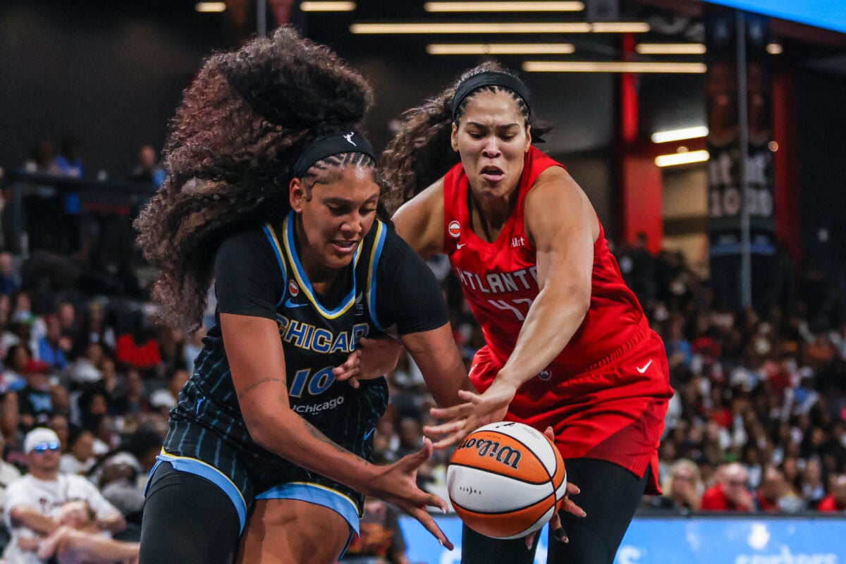 Jul 19, 2026; College Park, Georgia, USA; Atlanta Dream guard Rhyne Howard (10) reacts for the ball against Atlanta Dream forward Brionna Jones (42) during the third quarter at Gateway Center Arena at College Park. Mandatory Credit: Jordan Godfree-Imagn Images