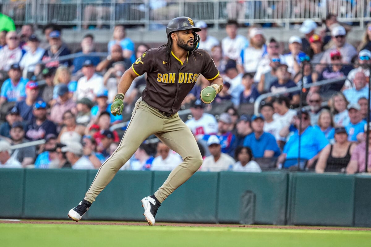 Jul 21, 2026; Cumberland, Georgia, USA; San Diego Padres right fielder Fernando Tatis Jr. (23) leads off of first base against the Atlanta Braves during the first inning at Truist Park. Mandatory Credit: Dale Zanine-Imagn Images