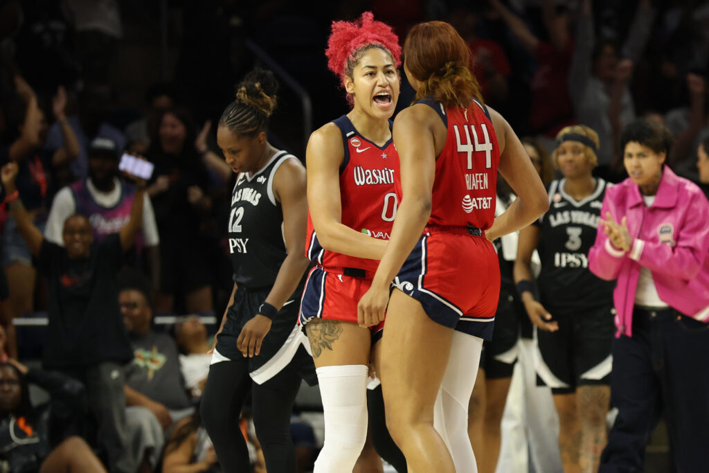 Jul 22, 2026; Washington, District of Columbia, USA; Washington Mystics center Shakira Austin (0) celebrates with Mystics forward Kiki Iriafen (44) after their game against the Las Vegas Aces at CareFirst Arena. Mandatory Credit: Geoff Burke-Imagn Images