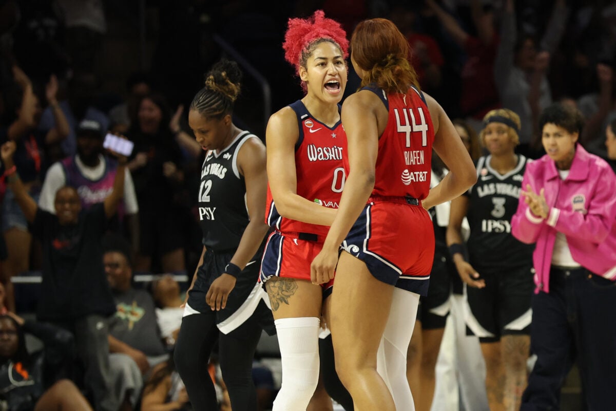 Jul 22, 2026; Washington, District of Columbia, USA; Washington Mystics center Shakira Austin (0) celebrates with Mystics forward Kiki Iriafen (44) after their game against the Las Vegas Aces at CareFirst Arena. Mandatory Credit: Geoff Burke-Imagn Images