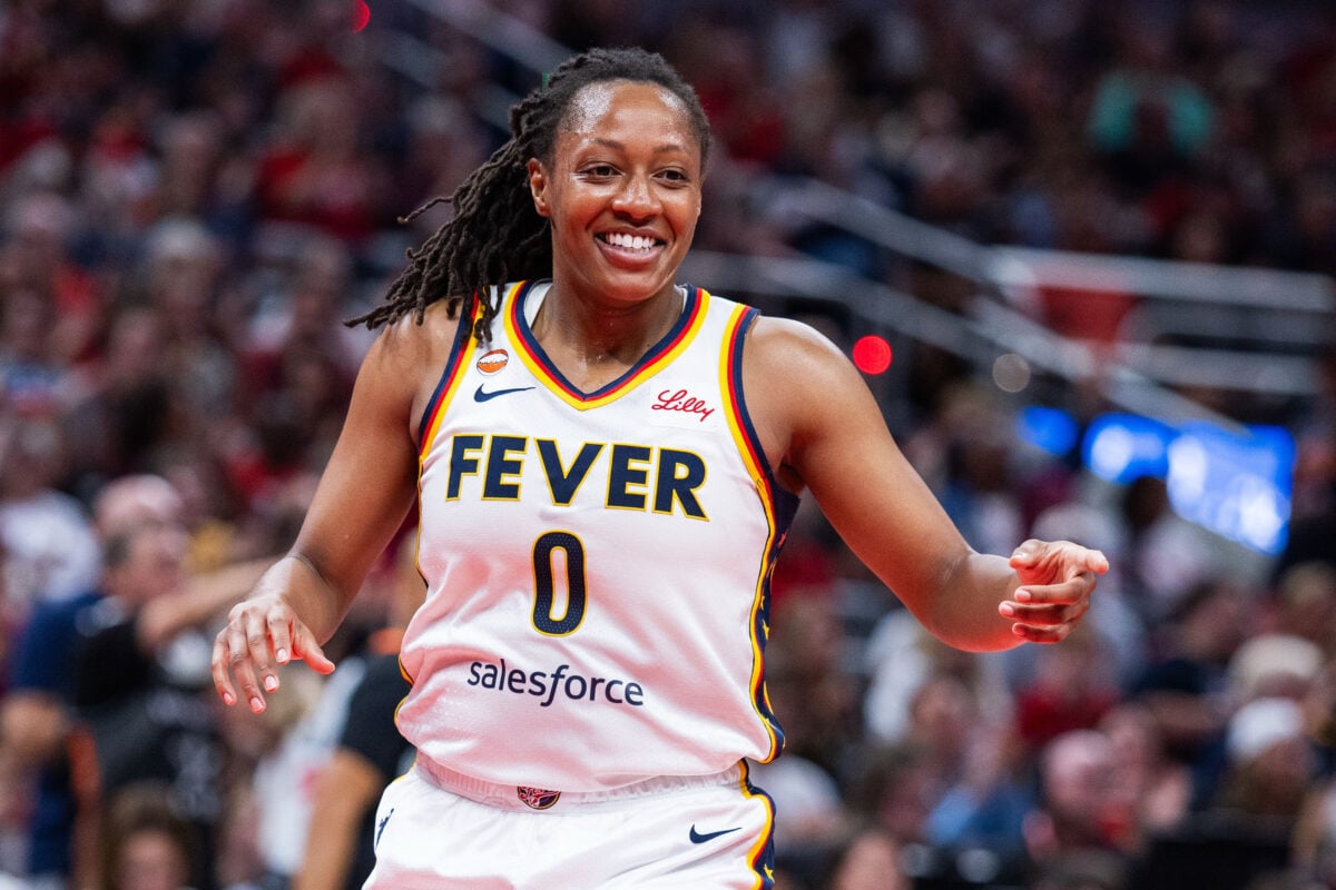 Jul 22, 2026; Indianapolis, Indiana, USA; Indiana Fever guard Kelsey Mitchell (0) celebrates a made shot  in the first half against the Connecticut Sun at Gainbridge Fieldhouse. Mandatory Credit: Trevor Ruszkowski-Imagn Images