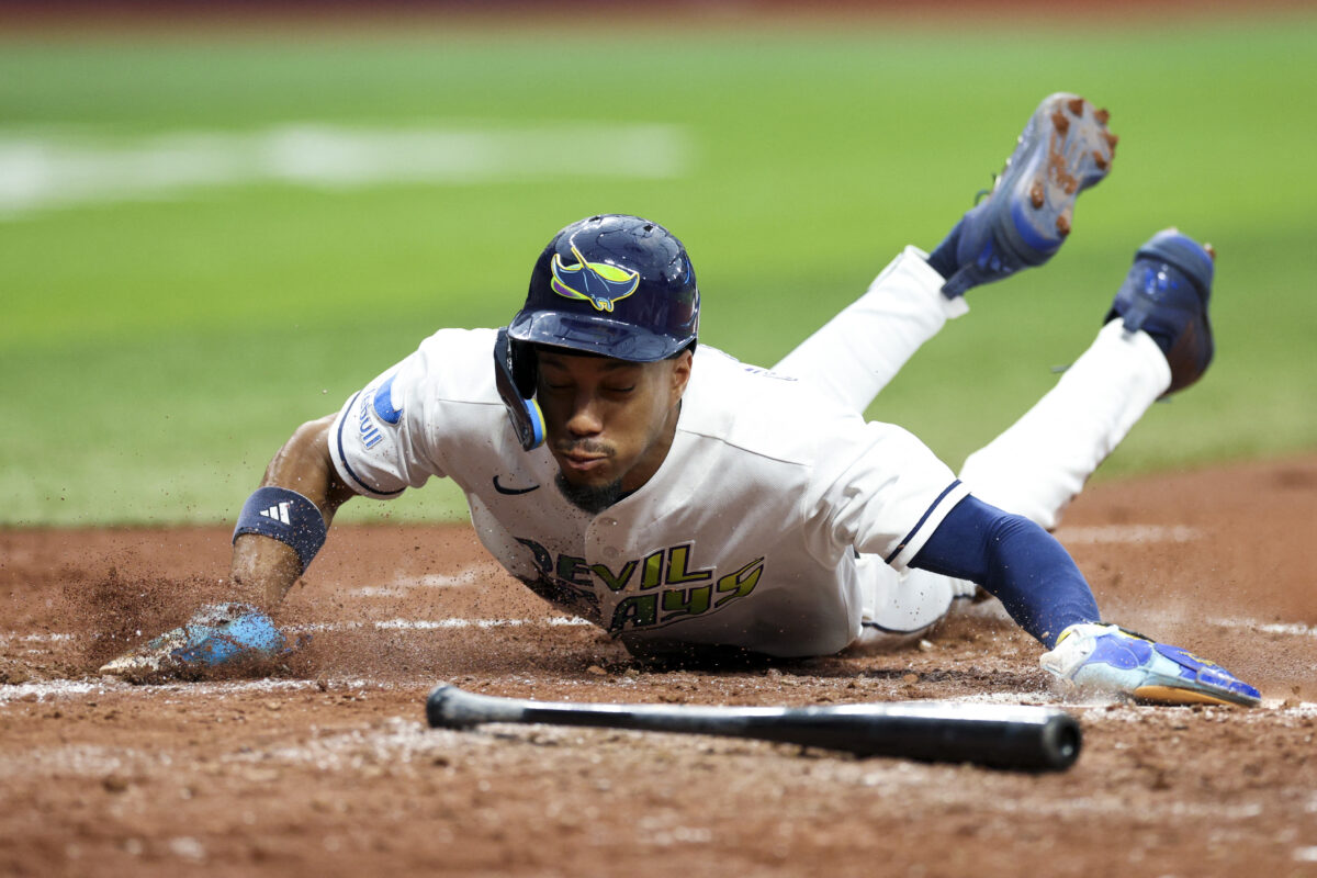 Jul 26, 2026; St. Petersburg, Florida, USA; Tampa Bay Rays left fielder Chandler Simpson (14) scores a run against the Cleveland Guardians in the fifth inning at Tropicana Field. Mandatory Credit: Nathan Ray Seebeck-Imagn Images