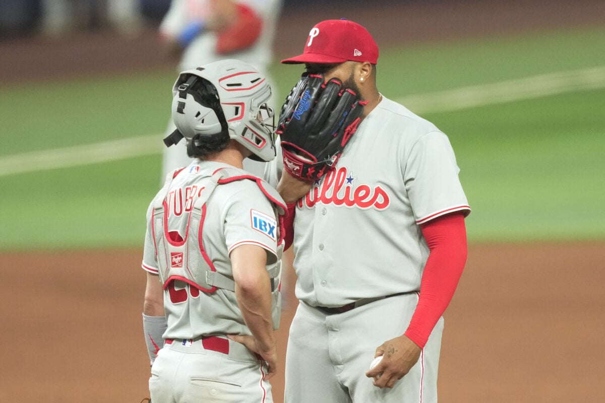 Jul 28, 2026; Miami, Florida, USA;  Philadelphia Phillies pitcher José Alvarado (46) talks with catcher Garrett Stubbs (21) during the seventh inning against the Miami Marlins at loanDepot Park. Mandatory Credit: Jim Rassol-Imagn Images