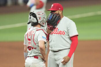 Jul 28, 2026; Miami, Florida, USA;  Philadelphia Phillies pitcher José Alvarado (46) talks with catcher Garrett Stubbs (21) during the seventh inning against the Miami Marlins at loanDepot Park. Mandatory Credit: Jim Rassol-Imagn Images