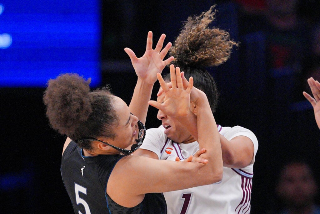 Jul 28, 2026; Minneapolis, Minnesota, USA; Toronto Tempo guard Kiki Rice (1) fouls Minnesota Lynx guard Olivia Miles (5) in the fourth quarter at Target Center. Mandatory Credit: Brad Rempel-Imagn Images