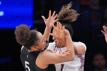 Jul 28, 2026; Minneapolis, Minnesota, USA; Toronto Tempo guard Kiki Rice (1) fouls Minnesota Lynx guard Olivia Miles (5) in the fourth quarter at Target Center. Mandatory Credit: Brad Rempel-Imagn Images