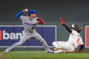 Jul 28, 2026; Minneapolis, Minnesota, USA; Kansas City Royals shortstop Andrew Velazquez (45) forces out Minnesota Twins pinch runner Austin Martin (16) and turns a double play on a ball hit by second baseman Kody Clemens (not pictured) in the eighth inning at Target Field. Mandatory Credit: Bruce Kluckhohn-Imagn Images