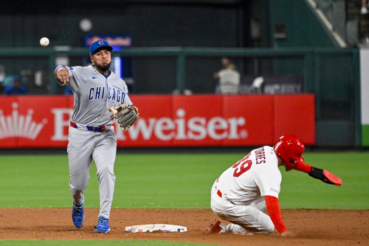 Jul 28, 2026; St. Louis, Missouri, USA; St. Louis Cardinals shortstop Bryan Torres (39) is out at second base as Chicago Cubs second baseman Pedro Ramirez (75) turns a double play in the eighth inning at Busch Stadium. Mandatory Credit: Joe Puetz-Imagn Images
