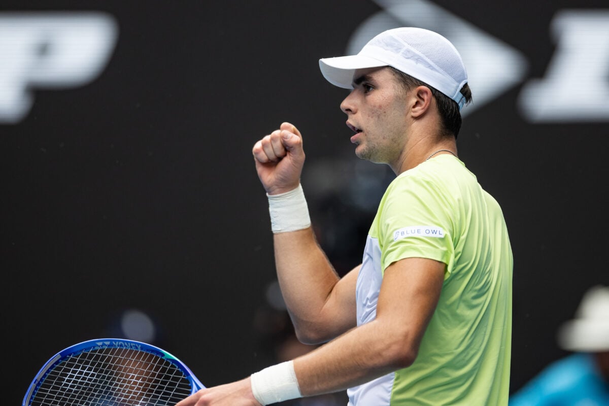 Jan 15, 2025; Melbourne, Victoria, Australia; Jaime Faria of Portugal celebrates during his match against Novak Djokovic of Serbia in the second round of the men's singles at the 2025 Australian Open at Melbourne Park. Mandatory Credit: Mike Frey-Imagn Images