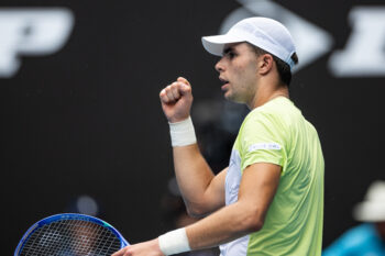 Jan 15, 2025; Melbourne, Victoria, Australia; Jaime Faria of Portugal celebrates during his match against Novak Djokovic of Serbia in the second round of the men's singles at the 2025 Australian Open at Melbourne Park. Mandatory Credit: Mike Frey-Imagn Images