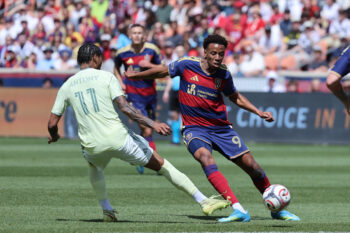 May 2, 2026; Sandy, Utah, USA; Real Salt Lake forward Morgan Guilavogui (9) and Portland Timbers forward Antony Alves Santos (11) play for the ball during the first half at America First Field. Mandatory Credit: Rob Gray-Imagn Images