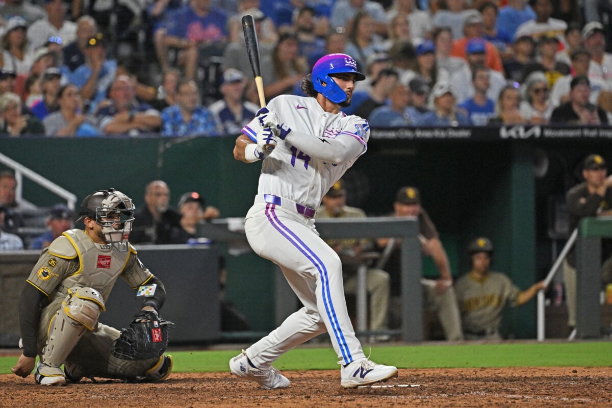 Jul 17, 2026; Kansas City, Missouri, USA;  Kansas City Royals right fielder Jac Caglianone (14) hits a single in the eighth inning against the San Diego Padres at Kauffman Stadium. Mandatory Credit: Peter Aiken-Imagn Images