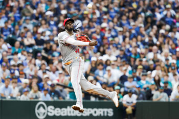 Jul 20, 2026; Seattle, Washington, USA; Cincinnati Reds shortstop Elly de la Cruz (44) throws to first base for an infield single against the Seattle Mariners during the fifth inning at T-Mobile Park. Mandatory Credit: Joe Nicholson-Imagn Images