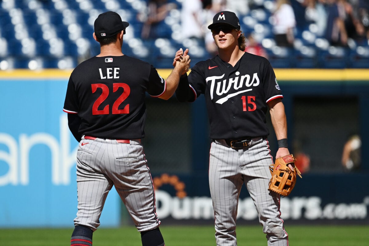 Jul 23, 2026; Cleveland, Ohio, USA; Minnesota Twins shortstop Brooks Lee (22) celebrates with second baseman Luke Keaschall (15) after the Twins beat the Cleveland Guardians at Progressive Field. Mandatory Credit: Ken Blaze-Imagn Images