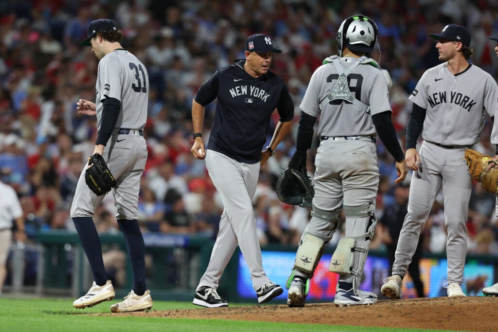 Jul 24, 2026; Philadelphia, Pennsylvania, USA; New York Yankees manager Aaron Boone (17) relieves New York Yankees pitcher Cam Schlittler (31) on a pitching change during the eighth inning against the Philadelphia Phillies at Citizens Bank Park. Mandatory Credit: Bill Streicher-Imagn Images