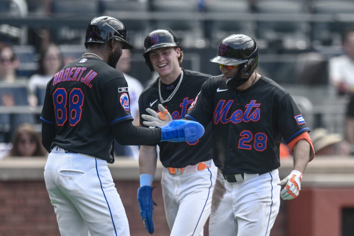 Jul 26, 2026; New York City, New York, USA; New York Mets center fielder Tyrone Taylor (28) celebrates with center fielder Luis Robert Jr. (88) and right fielder Carson Benge (3) after hitting a three-run home run against the Los Angeles Dodgers during the sixth inning at Citi Field. Mandatory Credit: John Jones-Imagn Images