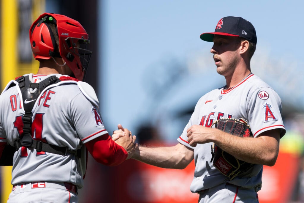 Jul 26, 2026; San Francisco, California, USA; Los Angeles Angels catcher Logan O'Hoppe (14) and pitcher Mitch Farris (70) celebrate defeating the San Francisco Giants at Oracle Park. Mandatory Credit: D. Ross Cameron-Imagn Images