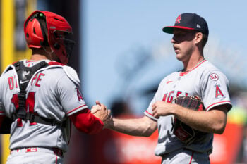 Jul 26, 2026; San Francisco, California, USA; Los Angeles Angels catcher Logan O'Hoppe (14) and pitcher Mitch Farris (70) celebrate defeating the San Francisco Giants at Oracle Park. Mandatory Credit: D. Ross Cameron-Imagn Images