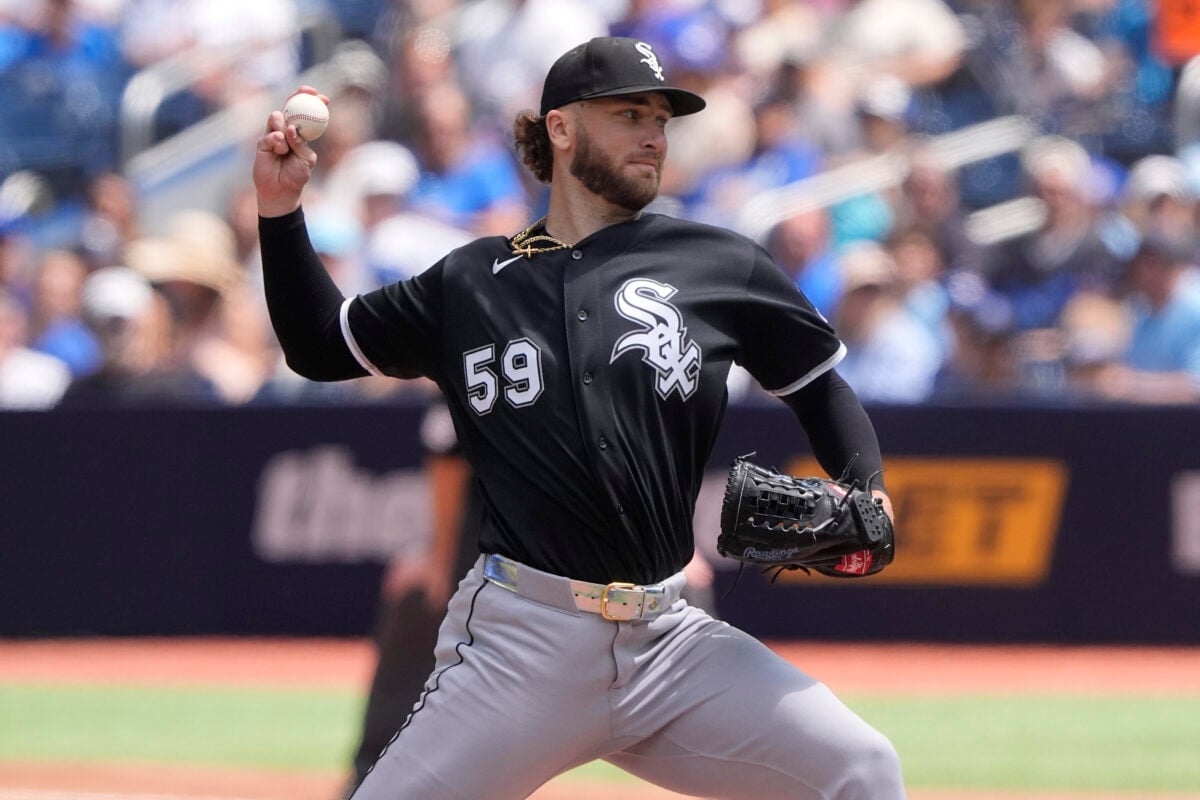 Jul 19, 2026; Toronto, Ontario, CAN; Chicago White Sox starting pitcher Sean Burke (59) pitches to the Toronto Blue Jays during the second inning at Rogers Centre. Mandatory Credit: John E. Sokolowski-Imagn Images
