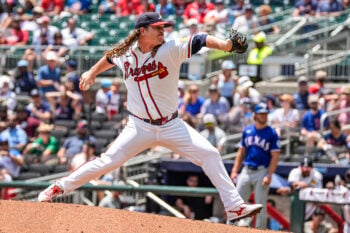 Jul 19, 2026; Cumberland, Georgia, USA; Atlanta Braves pitcher Grant Holmes (66) pitches against the Texas Rangers during the second inning at Truist Park. Mandatory Credit: Dale Zanine-Imagn Images