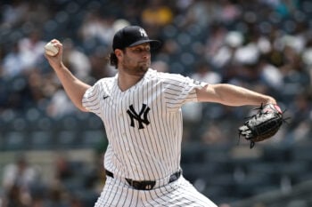 Jul 22, 2026; Bronx, New York, USA; New York Yankees pitcher Gerrit Cole (45) throws a pitch against the Pittsburgh Pirates during the first inning at Yankee Stadium. Mandatory Credit: John Jones-Imagn Images