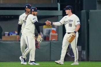 Jul 25, 2026; Minneapolis, Minnesota, USA; Minnesota Twins left fielder Austin Martin (16), center fielder Byron Buxton (25) and right fielder Alan Roden (18) celebrate the win over the Athletics at Target Field. Mandatory Credit: Bruce Kluckhohn-Imagn Images