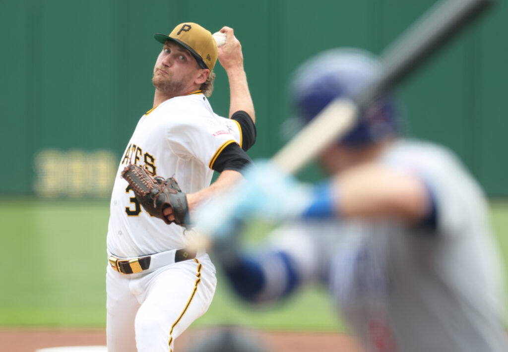 Jul 26, 2026; Pittsburgh, Pennsylvania, USA; Pittsburgh Pirates starting pitcher Braxton Ashcraft (35) delivers a pitches o Chicago Cubs left fielder Ian Happ (8) during the first inning at PNC Park. Mandatory Credit: Charles LeClaire-Imagn Images
