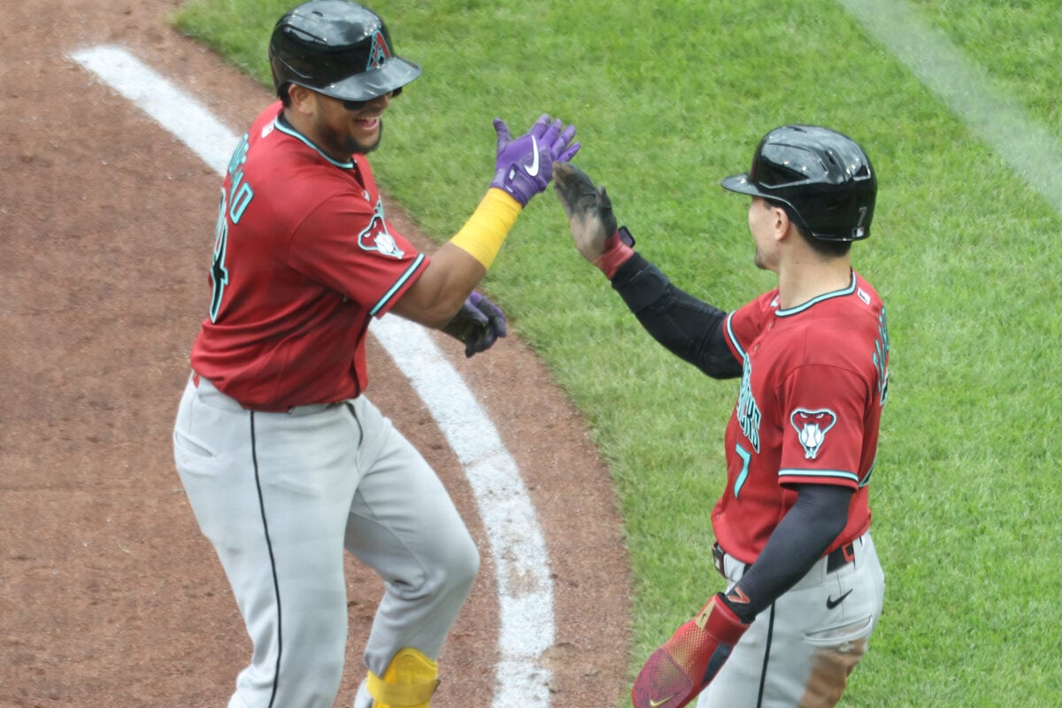 Jul 29, 2026; Pittsburgh, Pennsylvania, USA; Arizona Diamondbacks catcher Gabriel Moreno (14) celebrates his  two run home run with right fielder Corbin Carroll (7) against the Pittsburgh Pirates during the fourth inning at PNC Park. Mandatory Credit: Charles LeClaire-Imagn Images