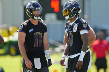 Jul 30, 2026; Owings Mills, MD, USA; Baltimore Ravens quarterbacks Lamar Jackson (8) and Skylar Thompson (11) talk during practice at Under Armour Peformance Center. Mandatory Credit: Mitch Stringer-Imagn Images