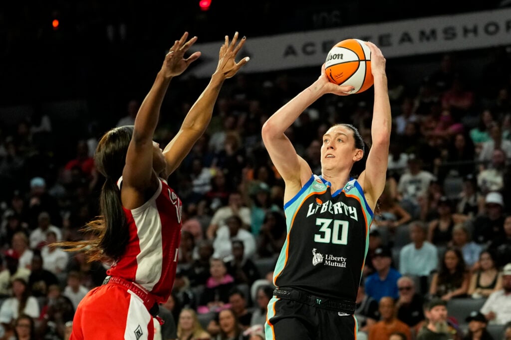Jul 30, 2026; Las Vegas, Nevada, USA; New York Liberty forward Breanna Stewart (30) shoots the ball against Las Vegas Aces guard Jackie Young (0) during the fourth quarter of a WNBA basketball game at Michelob Ultra Arena. Mandatory Credit: Lucas Peltier-Imagn Images