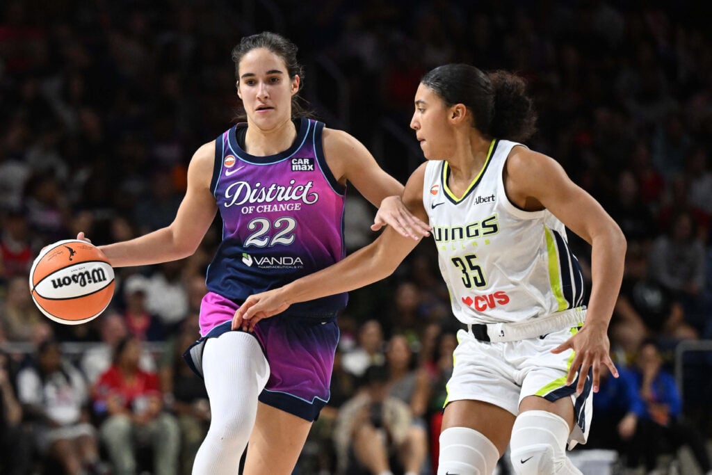 Jul 31, 2026; Washington, District of Columbia, USA; Washington Mystics guard Sonia Citron (22) drives as Dallas Wings guard Azzi Fudd defends during the second half at CareFirst Arena. Mandatory Credit: Brad Mills-Imagn Images