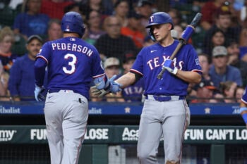 Jul 31, 2026; Houston, Texas, USA; Texas Rangers designated hitter Joc Pederson (3) celebrates with shortstop Corey Seager (5) after hitting a home run during the sixth inning against the Houston Astros at Daikin Park. Mandatory Credit: Troy Taormina-Imagn Images