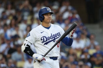 Jul 31, 2026; Los Angeles, California, USA; Los Angeles Dodgers designated hitter Shohei Ohtani (17) looks on before batting against Boston Red Sox starting pitcher Ranger Suarez (not pictured) during the first inning at Dodger Stadium. Mandatory Credit: Kiyoshi Mio-Imagn Images