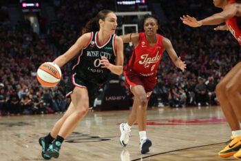Jul 31, 2026; Portland, Oregon, USA;  Portland Fire guard Carla Leite (0) drives to the basket against Indiana Fever guard Kelsey Mitchell (0) during the second half at Moda Center. Mandatory Credit: Jaime Valdez-Imagn Images