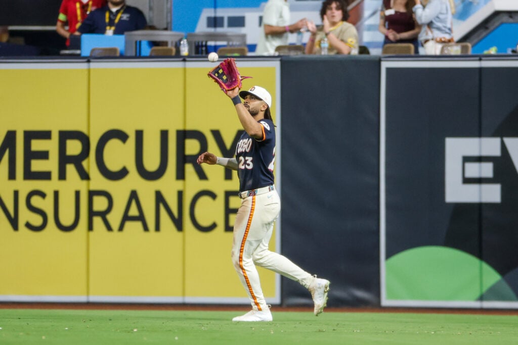 Jul 31, 2026; San Diego, California, USA; San Diego Padres right fielder Fernando Tatis Jr. (23) catches a fly ball for an out during the ninth inning against the San Francisco Giants at Petco Park. Mandatory Credit: David Frerker-Imagn Images