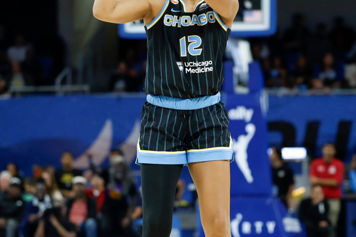 Aug 1, 2026; Chicago, Illinois, USA; Chicago Sky guard Sydney Taylor (12) shoots against the Las Vegas Aces during the first half of a WNBA game at Wintrust Arena. Mandatory Credit: Kamil Krzaczynski-Imagn Images