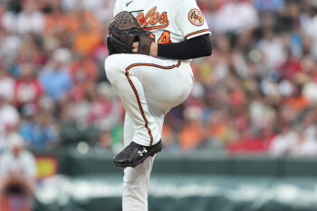 Aug 1, 2026; Baltimore, Maryland, USA; Baltimore Orioles pitcher Shane Baz (34) throws a pitch against the Philadelphia Phillies during the first inning at Oriole Park at Camden Yards. Mandatory Credit: Gregory Fisher-Imagn Images