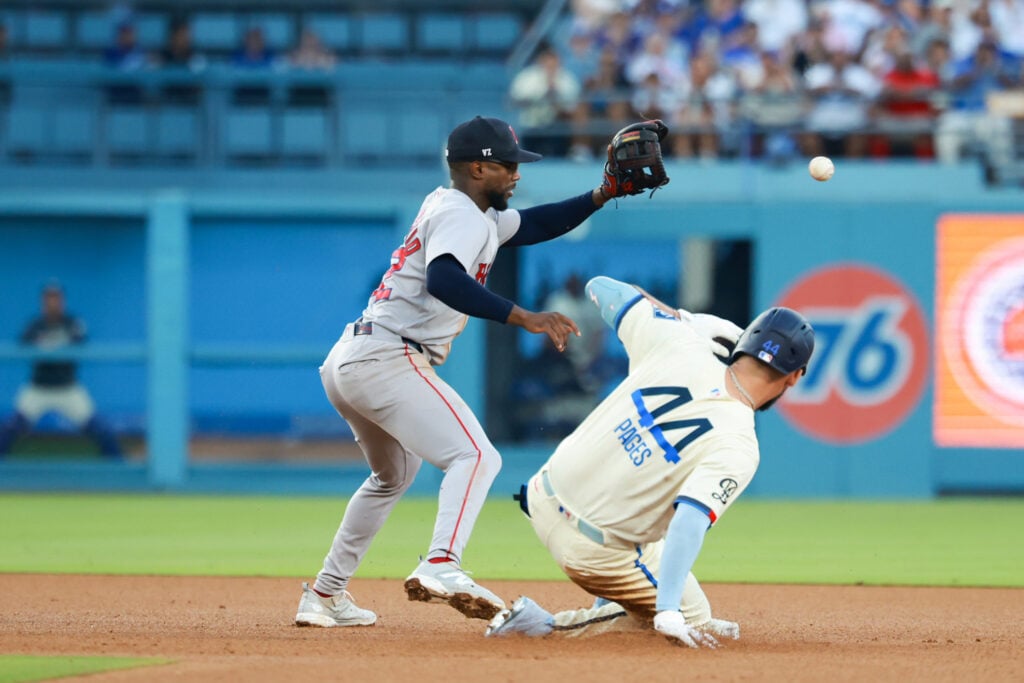 Aug 1, 2026; Los Angeles, California, USA; Los Angeles Dodgers center fielder Andy Pages (44) slides into second base in the bottom of the fifth inning against the Boston Red Sox at Dodger Stadium. Mandatory Credit: William Navarro-Imagn Images