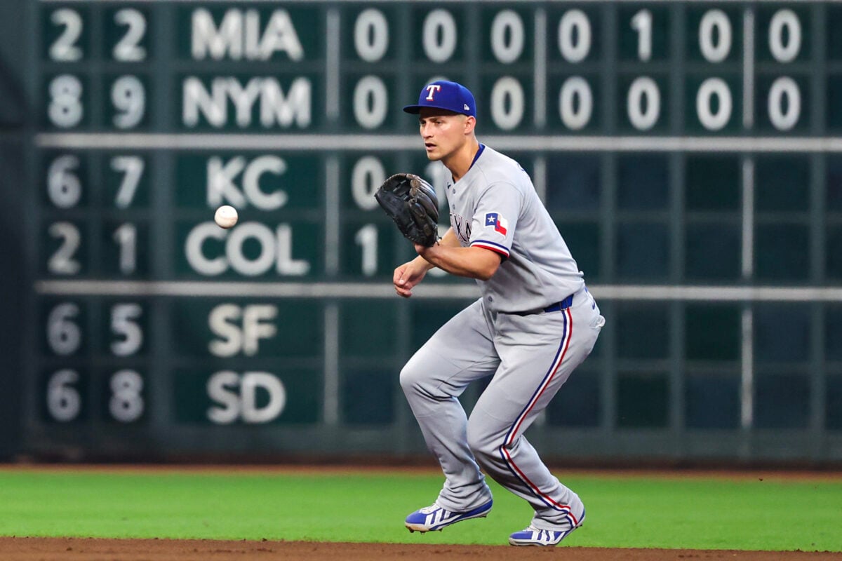 Aug 2, 2026; Houston, Texas, USA; Texas Rangers shortstop Corey Seager (5) plays Houston Astros shortstop Nick Allen (20) (not pictured) ground ball for an out  in the sixth inning at Daikin Park. Mandatory Credit: Thomas Shea-Imagn Images