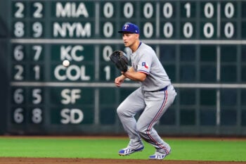 Aug 2, 2026; Houston, Texas, USA; Texas Rangers shortstop Corey Seager (5) plays Houston Astros shortstop Nick Allen (20) (not pictured) ground ball for an out  in the sixth inning at Daikin Park. Mandatory Credit: Thomas Shea-Imagn Images