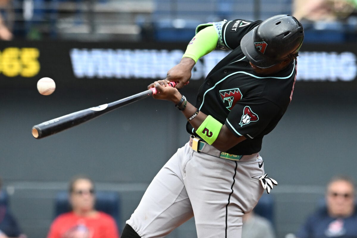 Aug 2, 2026; Cleveland, Ohio, USA; Arizona Diamondbacks shortstop Geraldo Perdomo (2) hits a single during the eighth inning against the Cleveland Guardians at Progressive Field. Mandatory Credit: Ken Blaze-Imagn Images