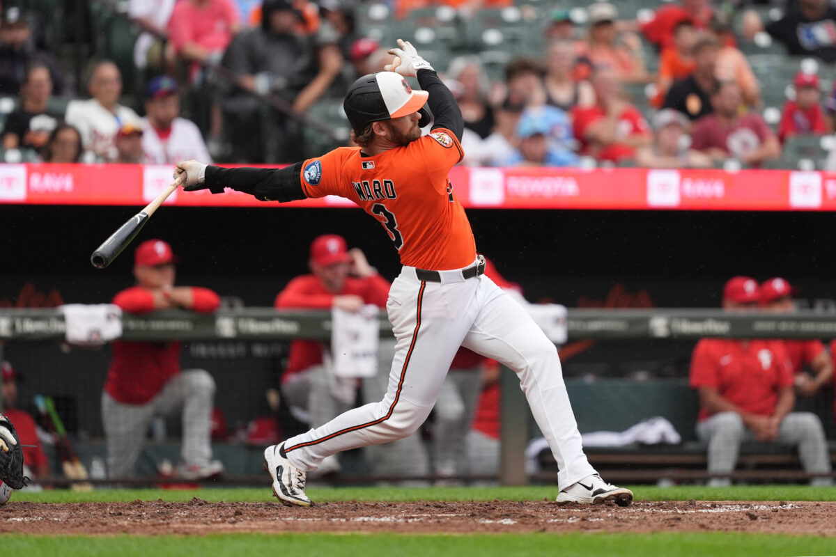 Aug 2, 2026; Baltimore, Maryland, USA; Baltimore Orioles designated hitter Taylor Ward (3) hits a single against the Philadelphia Phillies during the fourth inning at Oriole Park at Camden Yards. Mandatory Credit: Gregory Fisher-Imagn Images